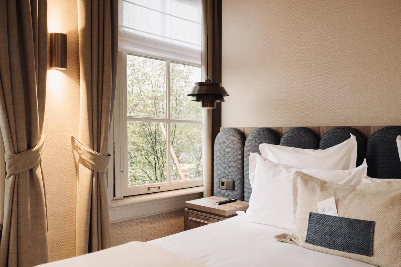 Hotel 717 أمستردام المظهر الخارجي الصورة A bedroom at the hotel