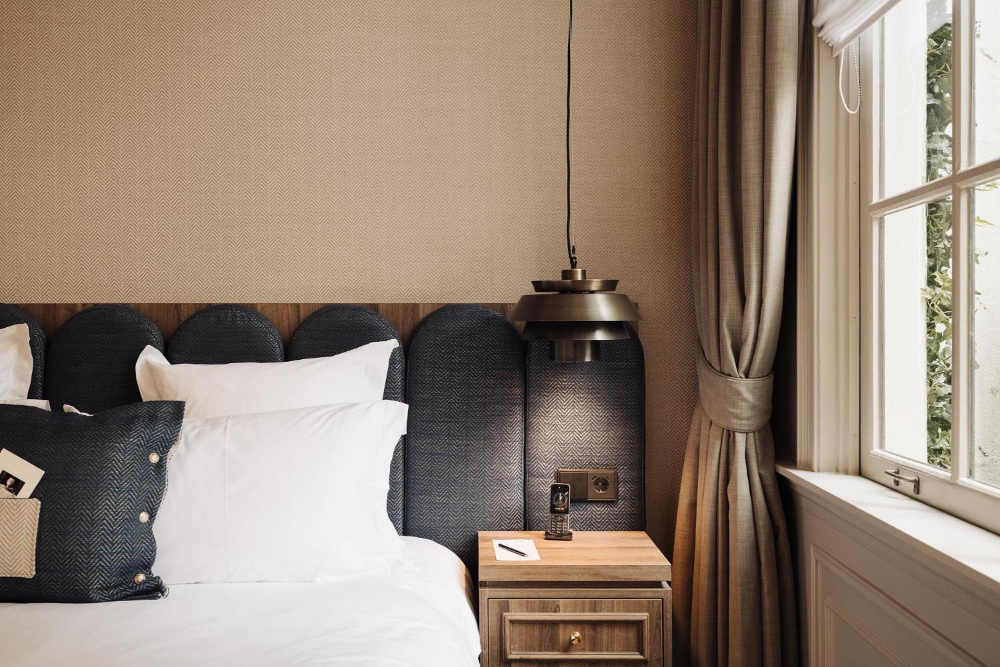 Hotel 717 أمستردام المظهر الخارجي الصورة A bedroom at the hotel